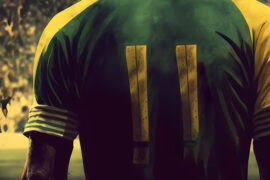 Desenho de um jogador de futebol simbolizando o Ramário de costas com uma camisa verde e amarela e o número 11 estampado, em um campo de futebol
